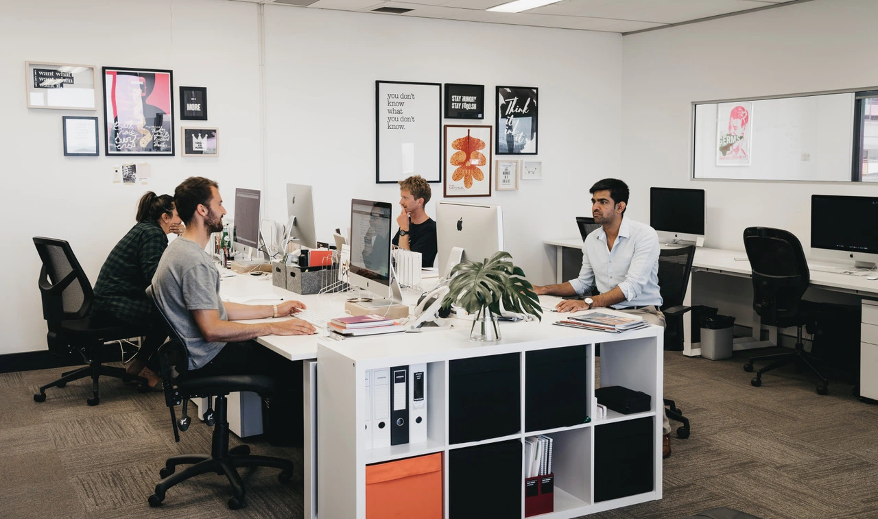 The Webwingz team at their desks